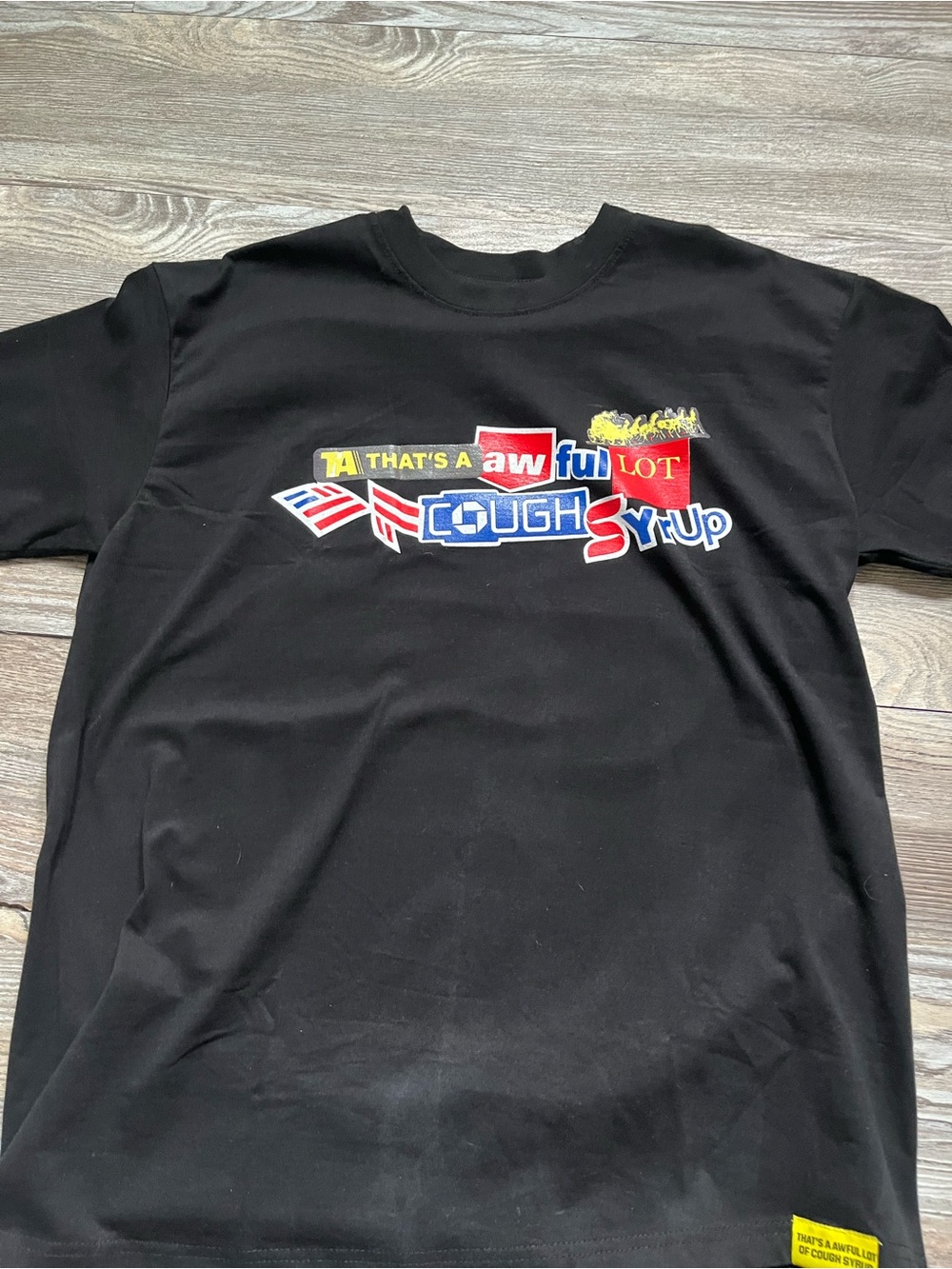 Black Short-Sleeve Graphic Tee with Colorful Chest Logo